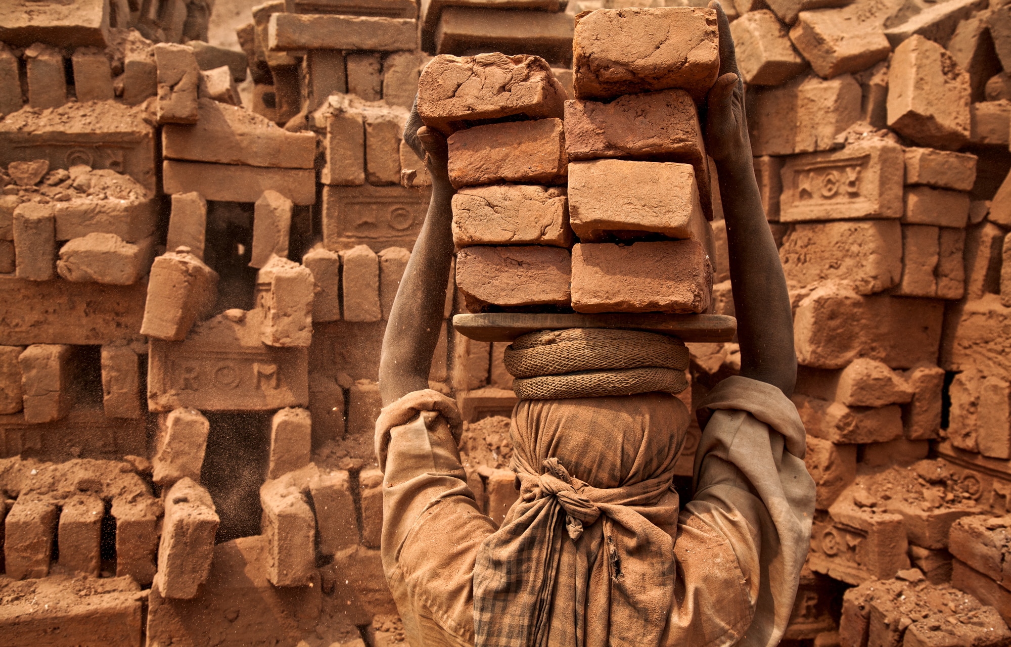 Carrying bricks in India