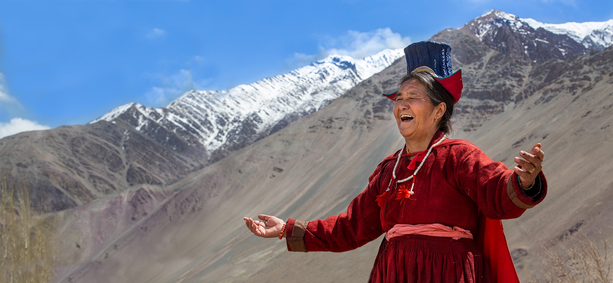 In Ladakh, a region in the Himalayas in northwestern India, a woman is perched atop the world, standing at elevations reaching 15,000 feet.