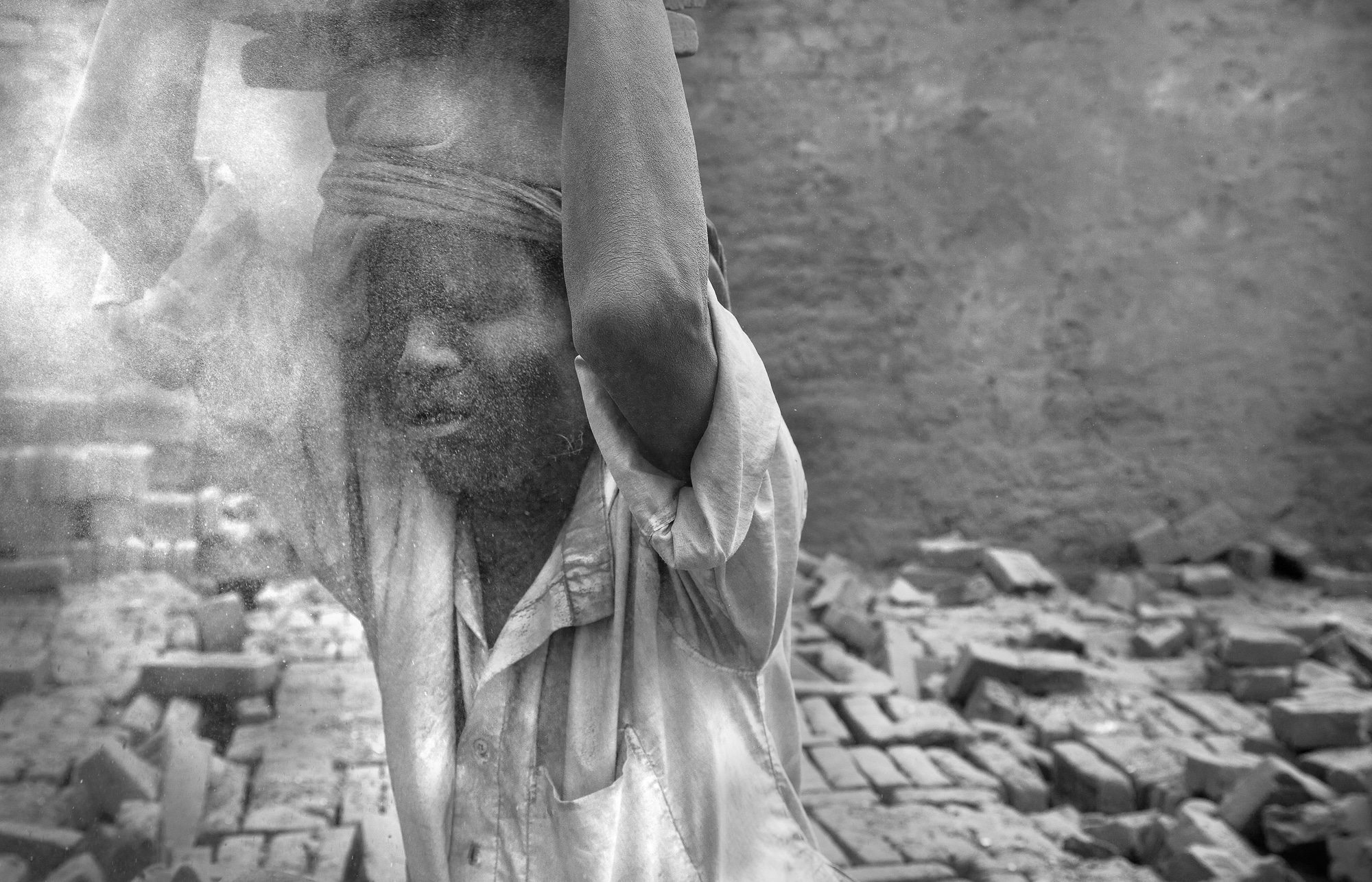Dust falling on a boys head in Nepal