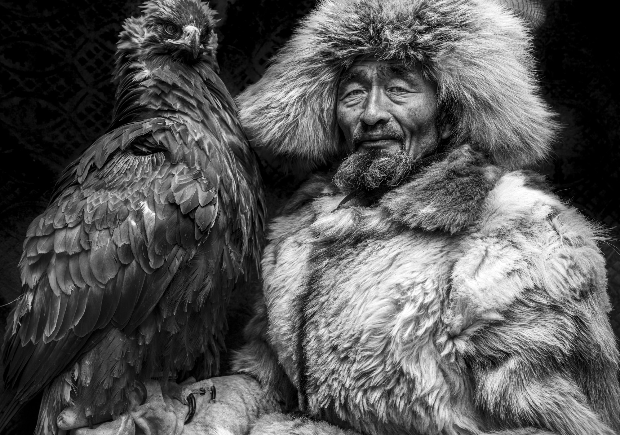 Man with a bird in Mongolia