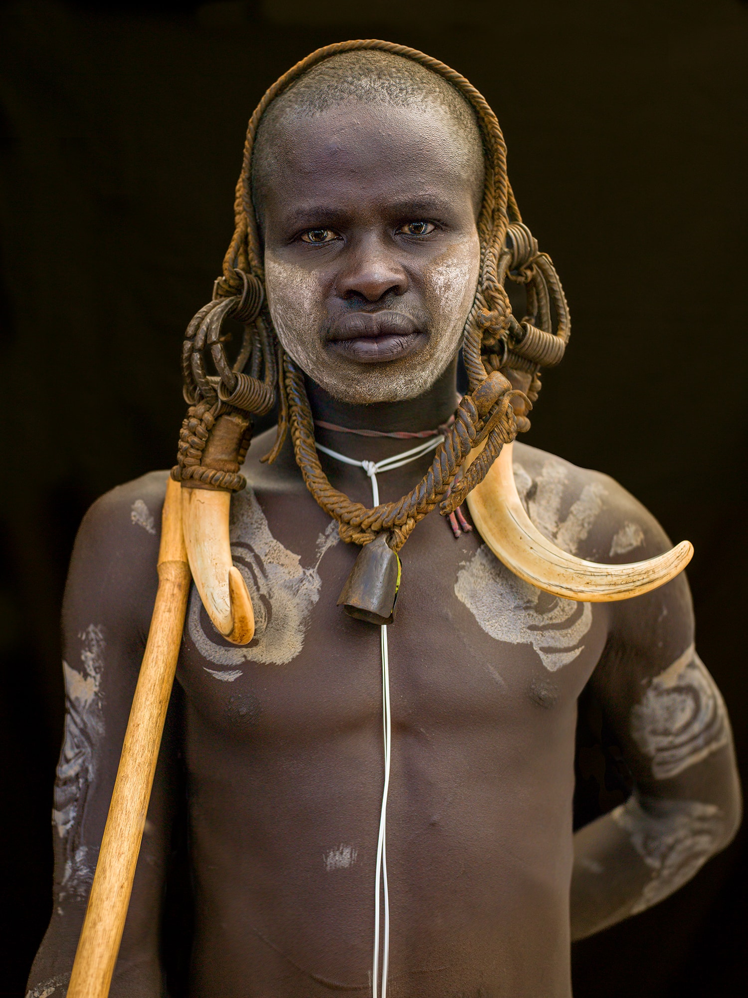 The Mursi wear these horns and fierce accessories, the headwear included bones and metal objects. Scarification is also common among men, and lip plates are worn by women.