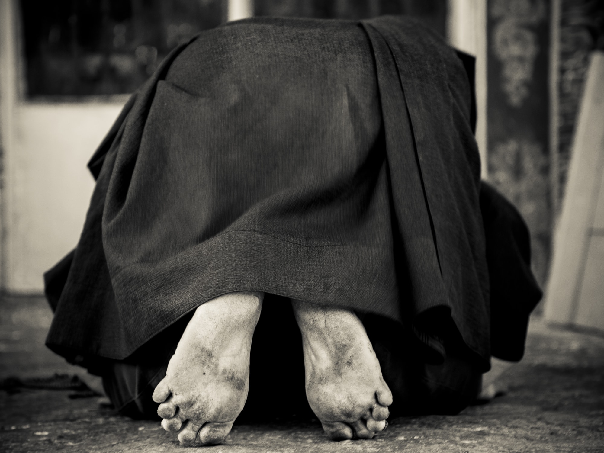 Person kneeling in Bhutnan