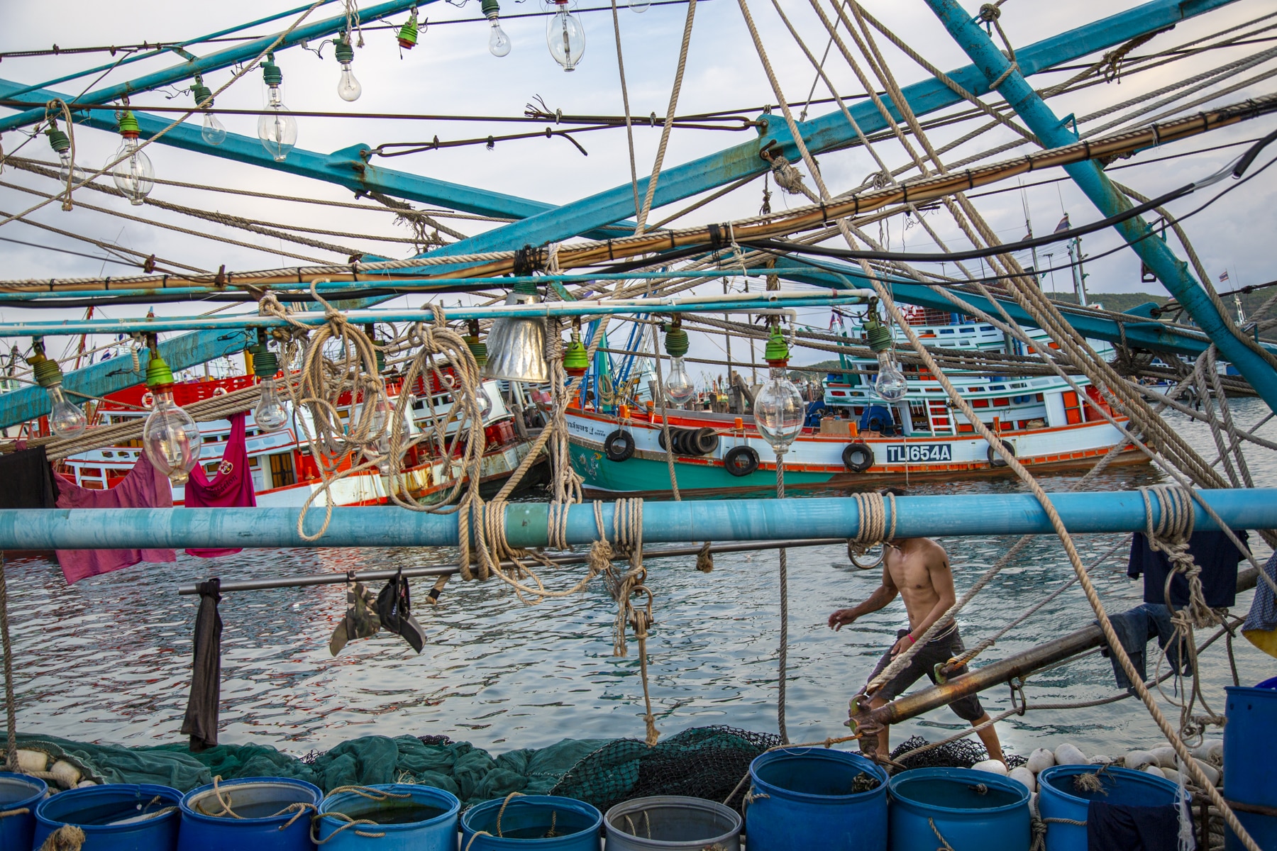 Man running the length of the vessel in Thailand