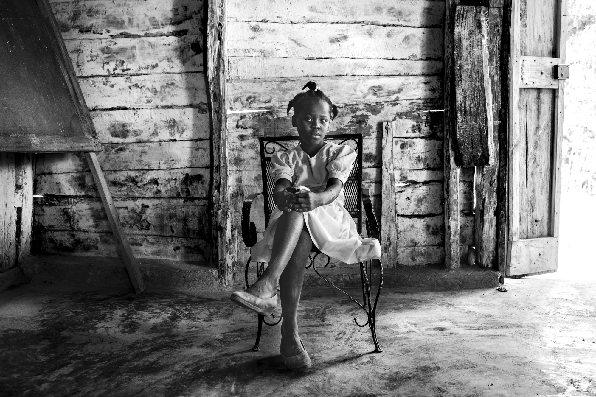 Young Girl in a school house in Haiti