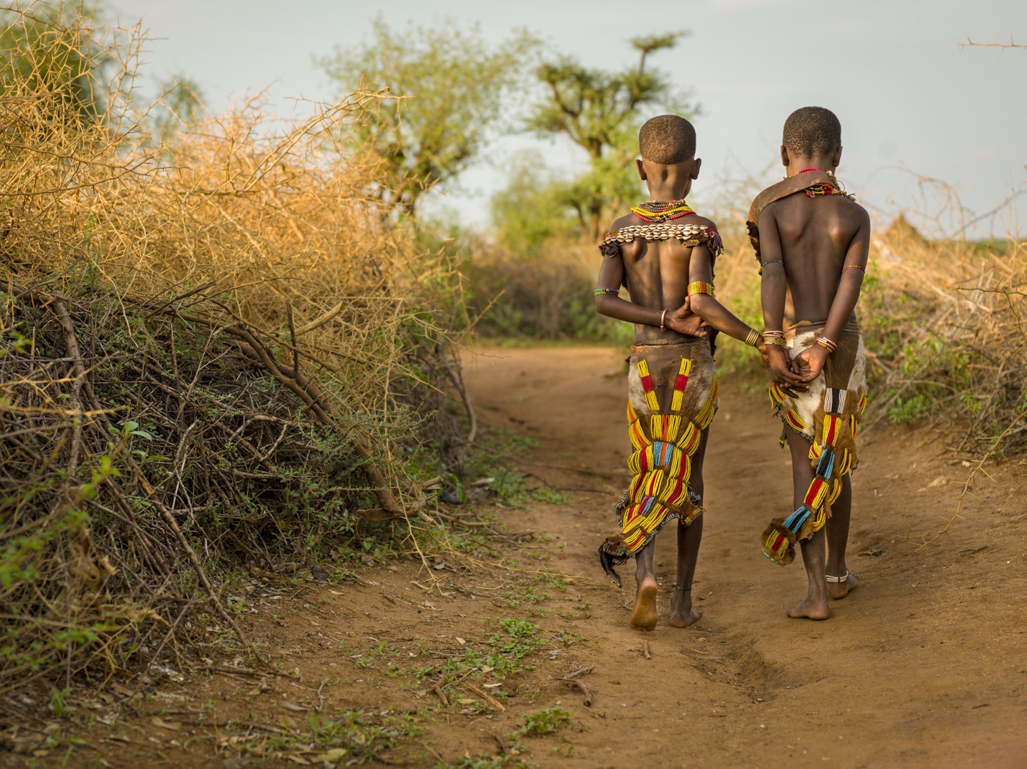 Ethiopian children walking side by side