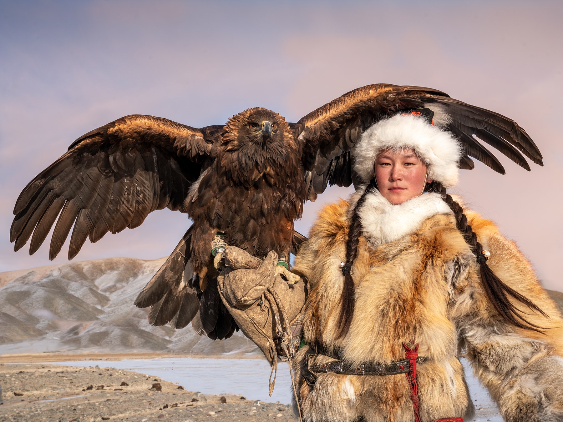 Women with her bird in Mongolia