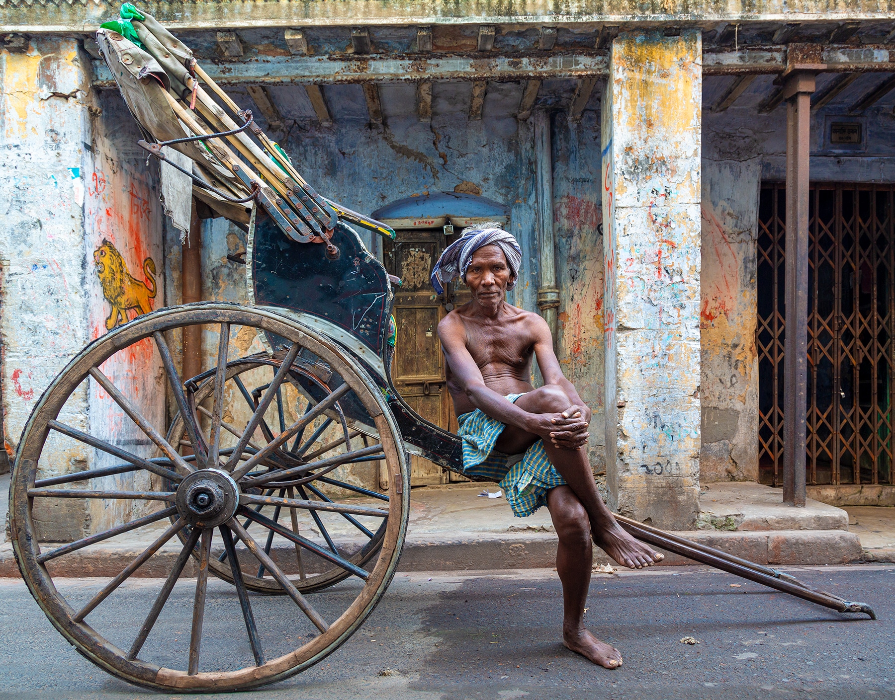 He is a model entrepreneur in one sense of the word, operating a no-carbon footprint rickshaw powered by human strength and coordination, that for more than 130 years has woven itself into the cultural and economic fabric of Kolkata.